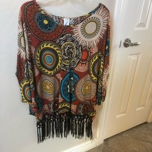 Poncho style blouse with fringe bottom